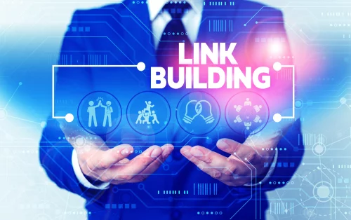 Businessperson in a suit holding a holographic interface labeled 'LINK BUILDING' with icons for networking, teamwork, and data.